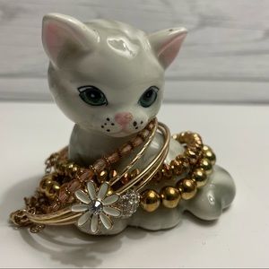 Rue 21-Set of three gold bracelets.